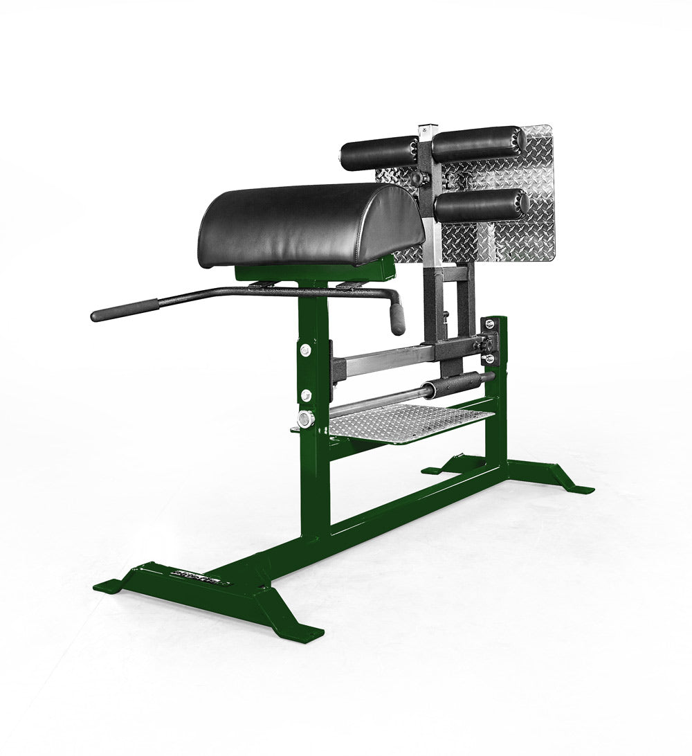 Green gym machine with black padding on a white background
