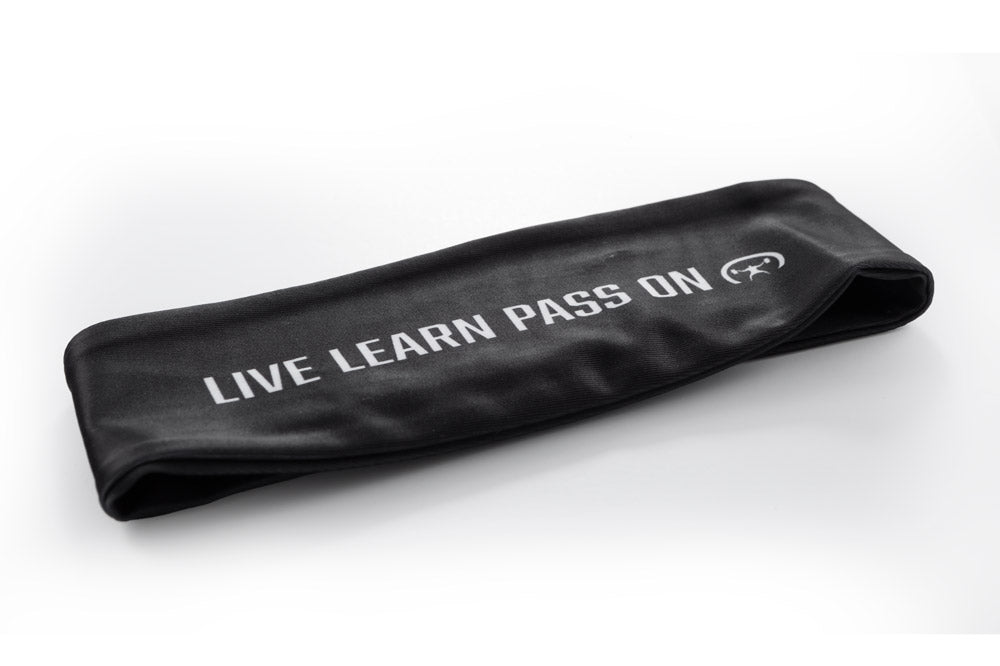 Black band with 'Live Learn Pass On' text on a white background