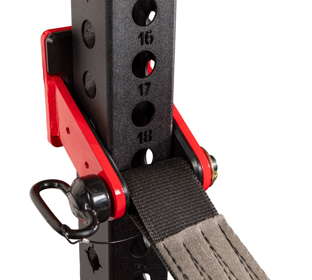 Close-up of a red and black weightlifting bar with a strap and carabiner on a white background